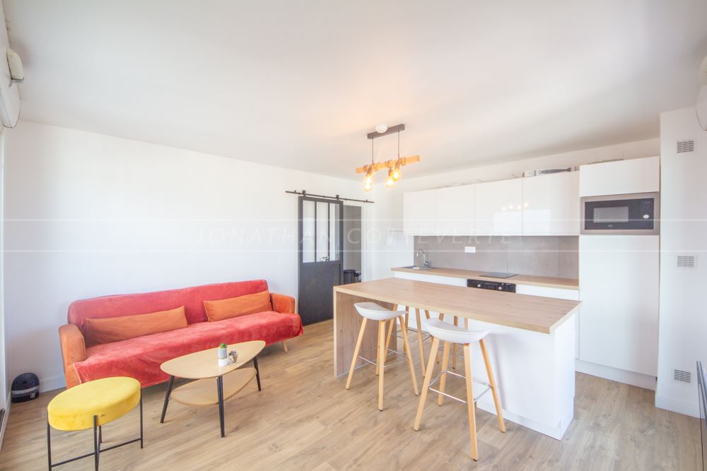 APPARTEMENT - 4 CHAMBRES - REFAIT A NEUF - DERNIER ETAGE - DALLE BETON - RARE SUR LE MARCHE - EXCELLENT DPE. photo 2